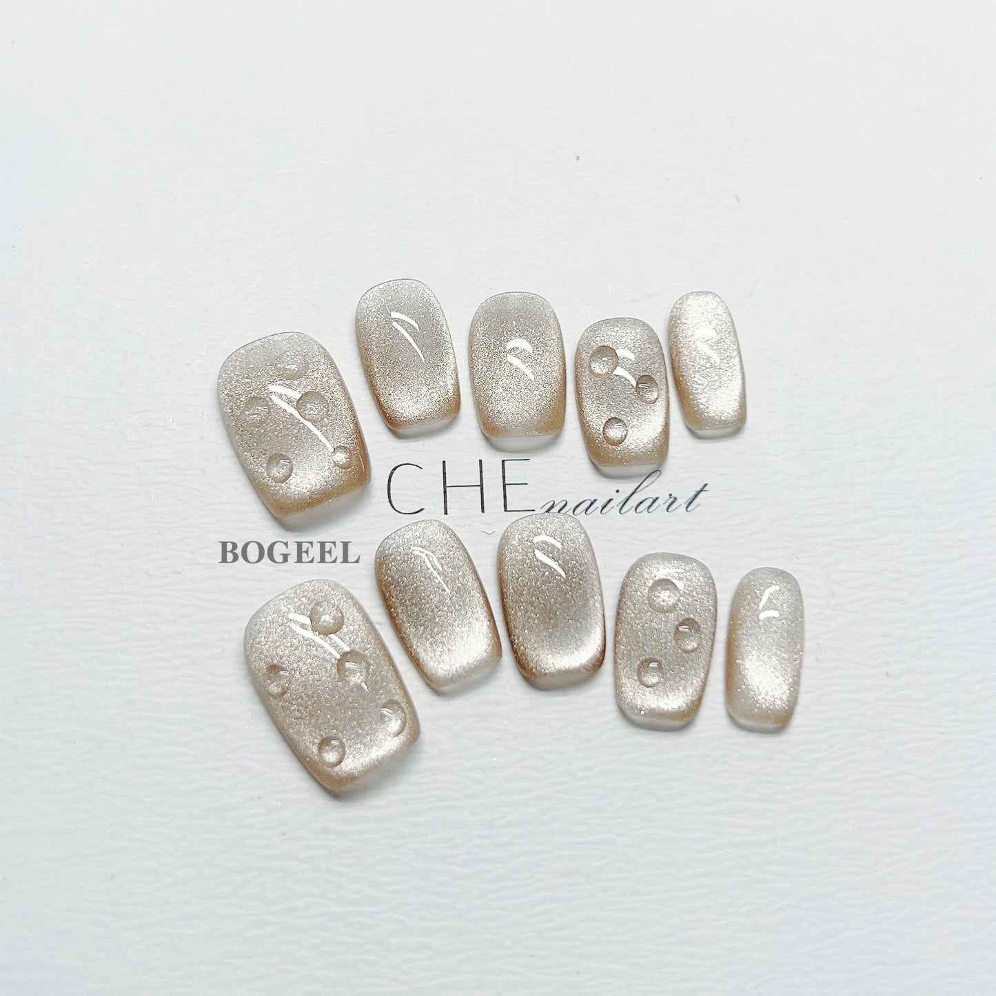 Water Drops Almond Press-On Nails – Glossy Nude Luxury Nail Set | Reusable Gel Finish